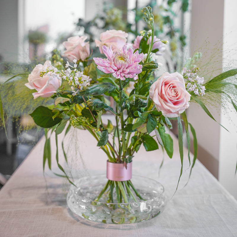 Bouquet final réalisé avec le champagne rose Hanataba, illustrant les magnifiques résultats possibles.