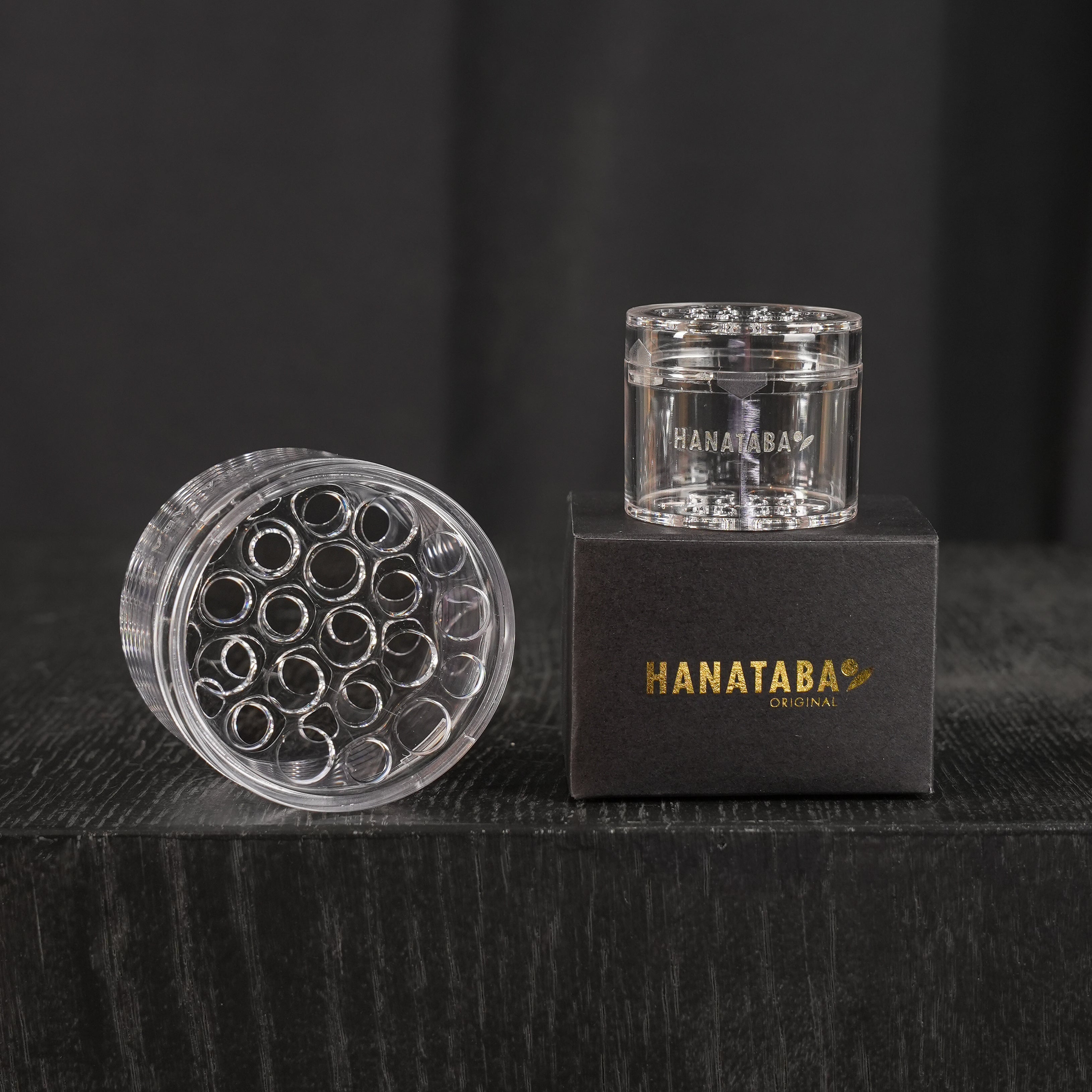 Clear Hanataba Bouquet Twister set against a dark background, showcasing its sleek and transparent design.